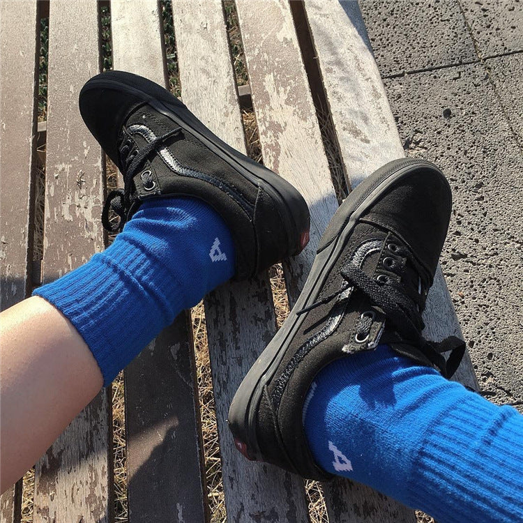 All black canvas shoes tide